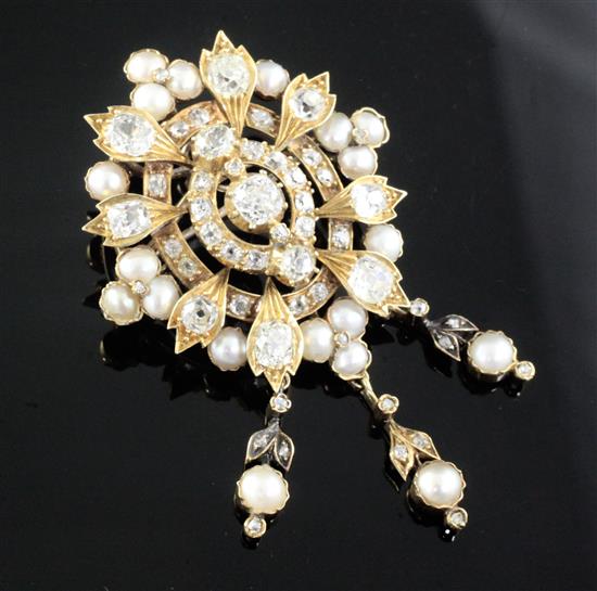 A Victorian style gold split pearl and diamond set oval drop pendant brooch, 63mm.